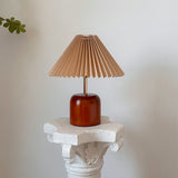 Cylvara wood table lamp with warm khaki pleated shade