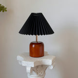 Cylvara wood table lamp with black pleated shade