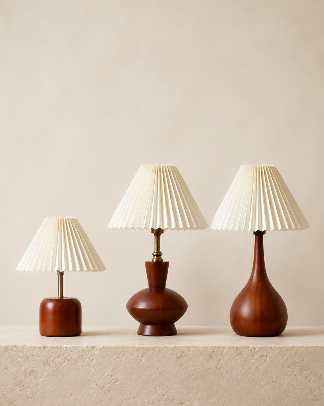 Walnut-tone table lamp forms arranged for size and placement guidance